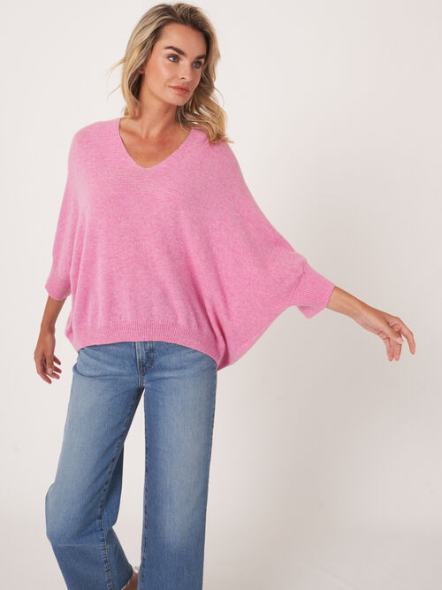 Oversized mouwloze trui met V-hals