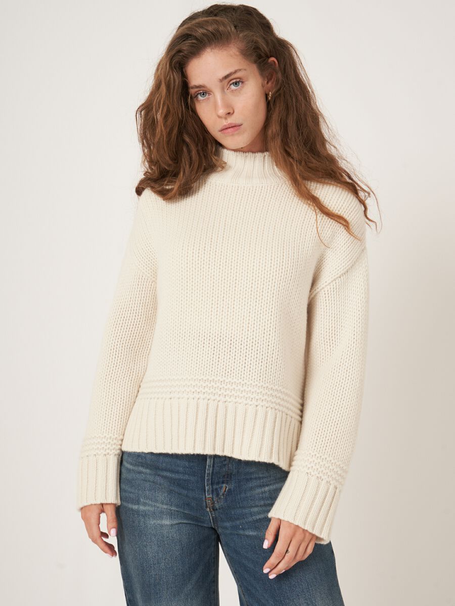 Stand collar sweater with ribbed hem with fancy knit details image number 0