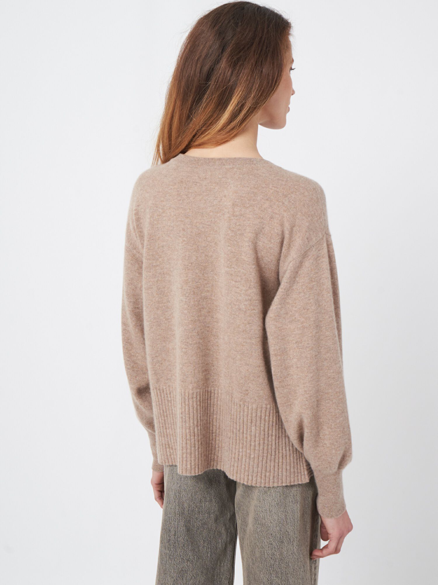 Cashmere sweater with buttoned side slits Cashmere sweater with buttoned side slits