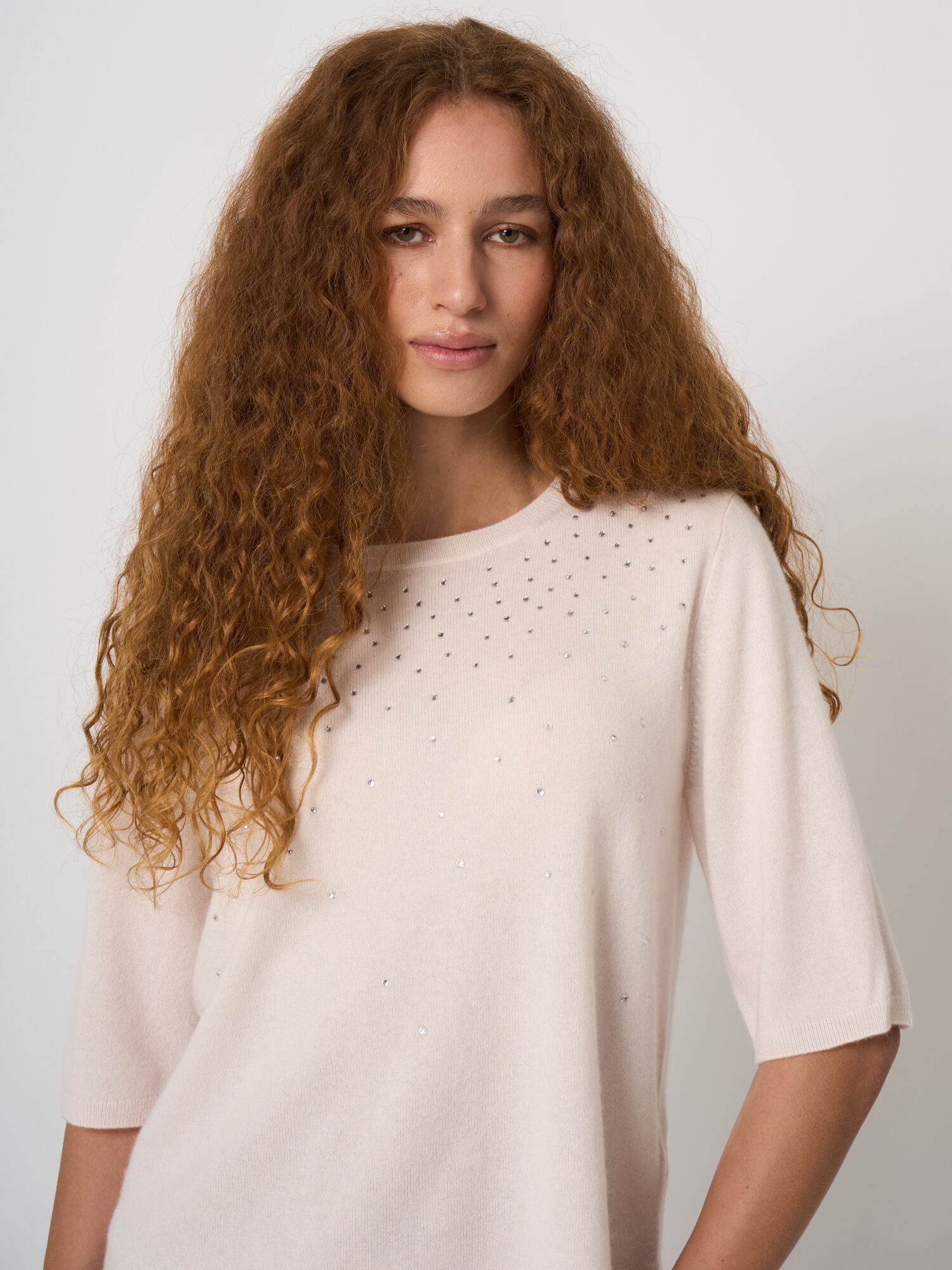 Biologische cashmere trui met subtiele hotfix