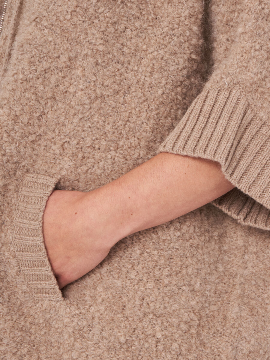 Chunky knit sleeveless poncho with zip closure image number 9