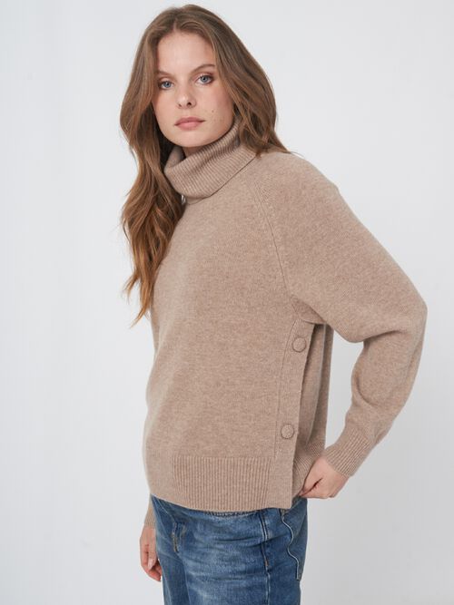 Turtleneck sweater with buttoned sides