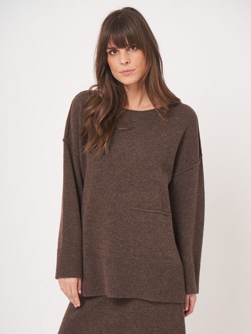 Oversized lambswool sweater with front pocket