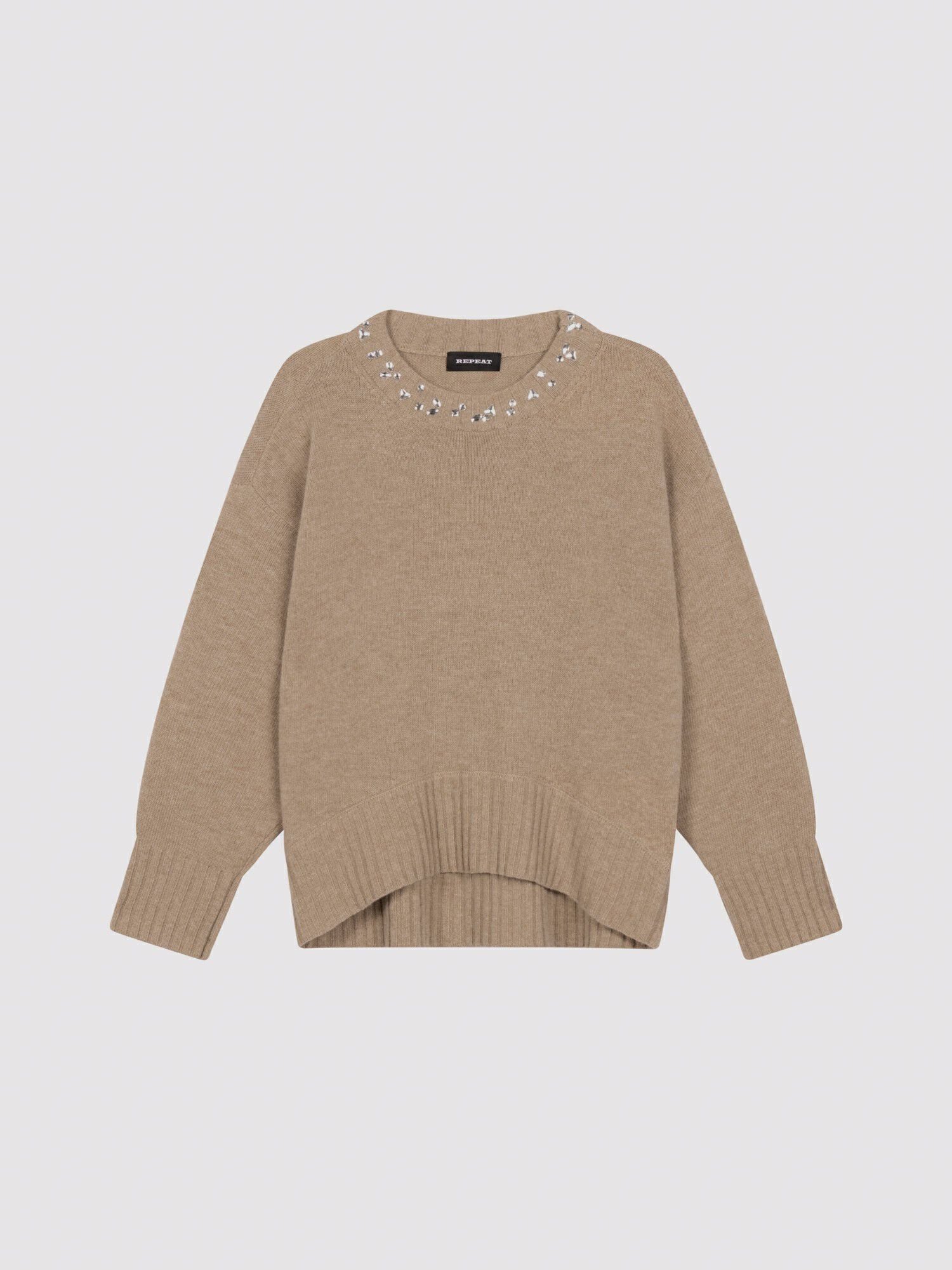 Oversized knit sweater with rhinestone detail