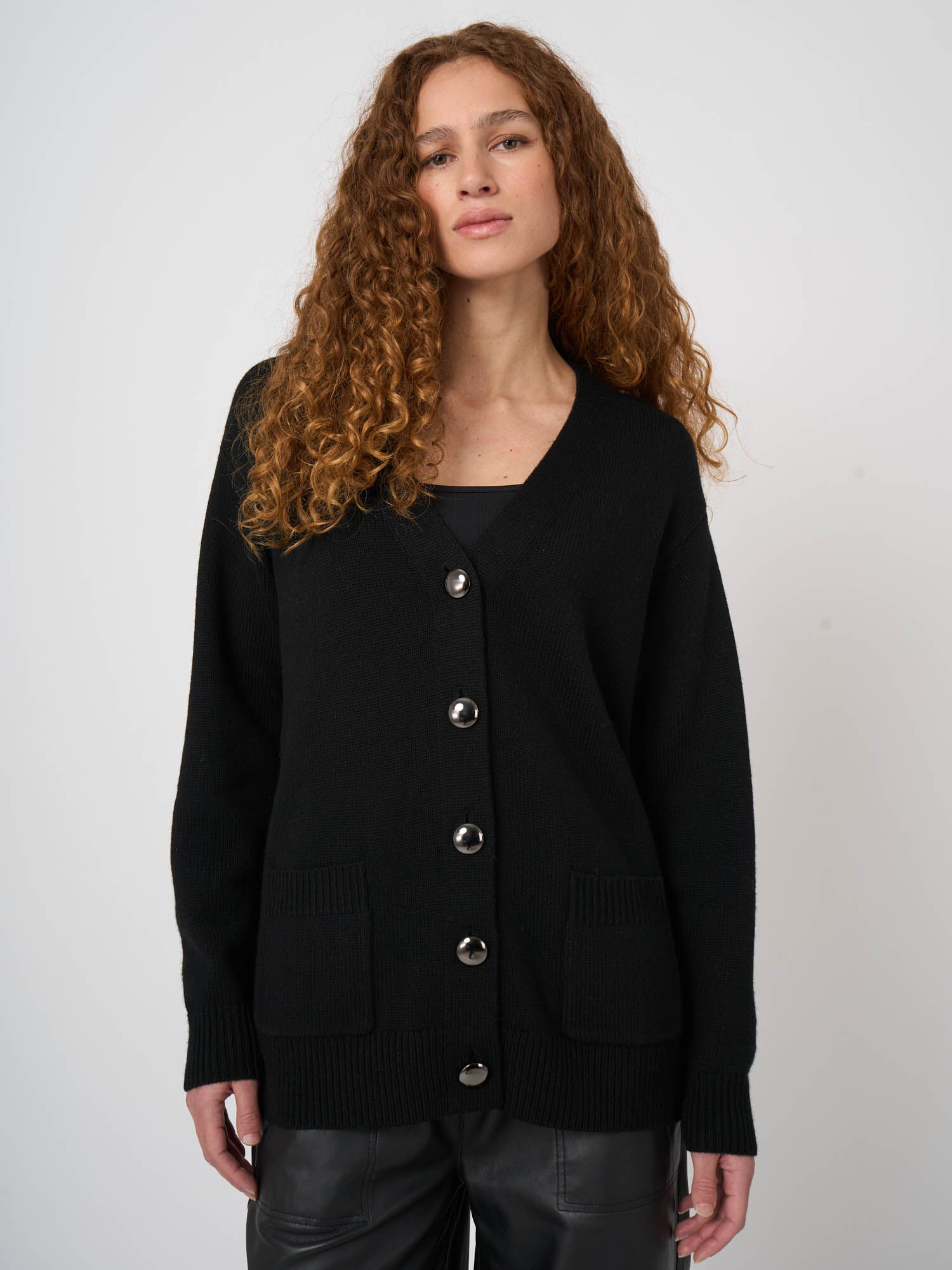 Oversized merinowollen vest met metalen knopen