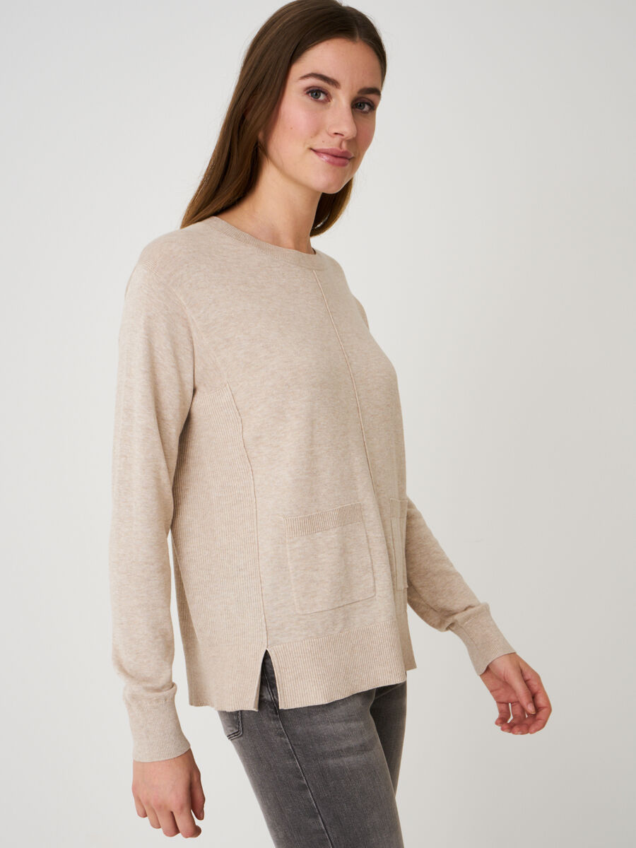 Loose sweater with front pockets and rib knit details on the side image number 0