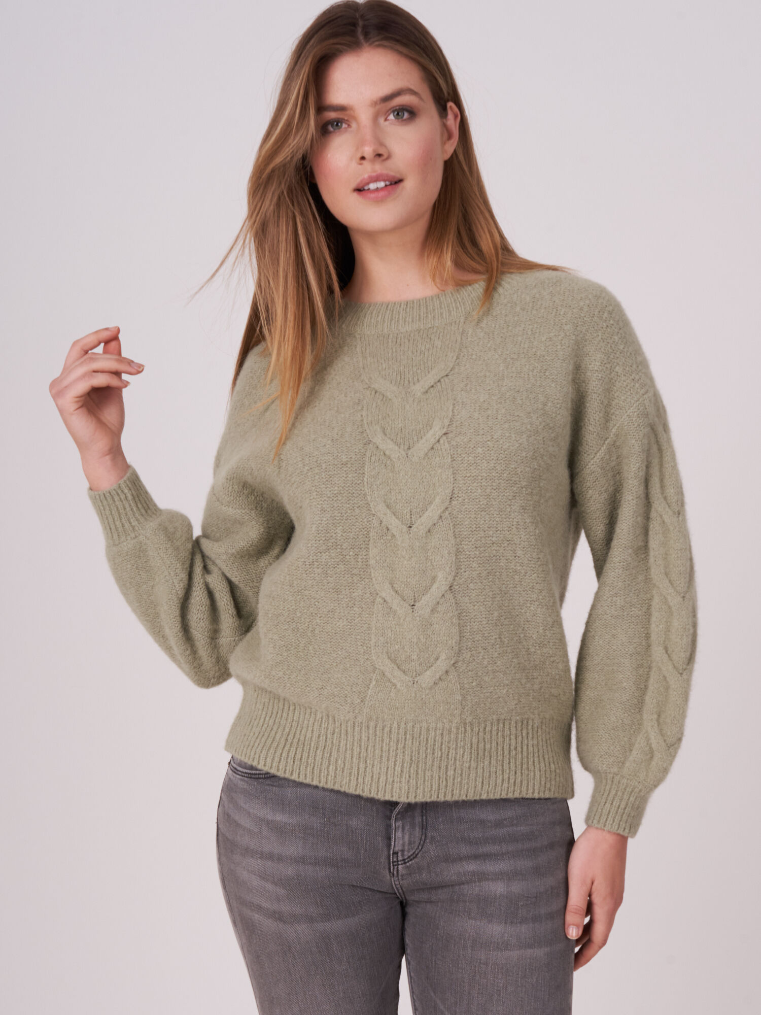 Cropped cable knit sweater