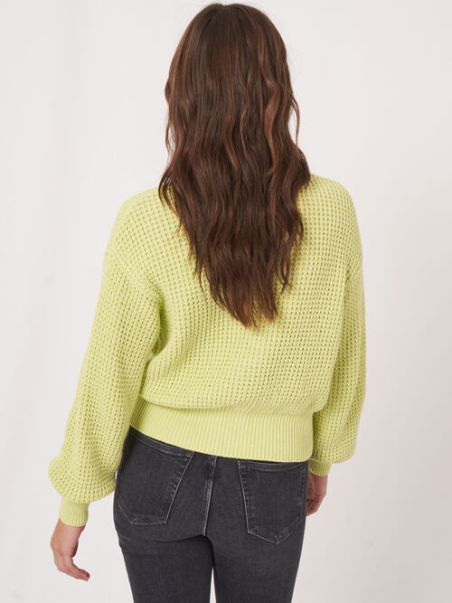 Grof gebreid vest met pofmouwen