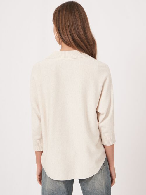 Trui met polokraag en ronde zoom