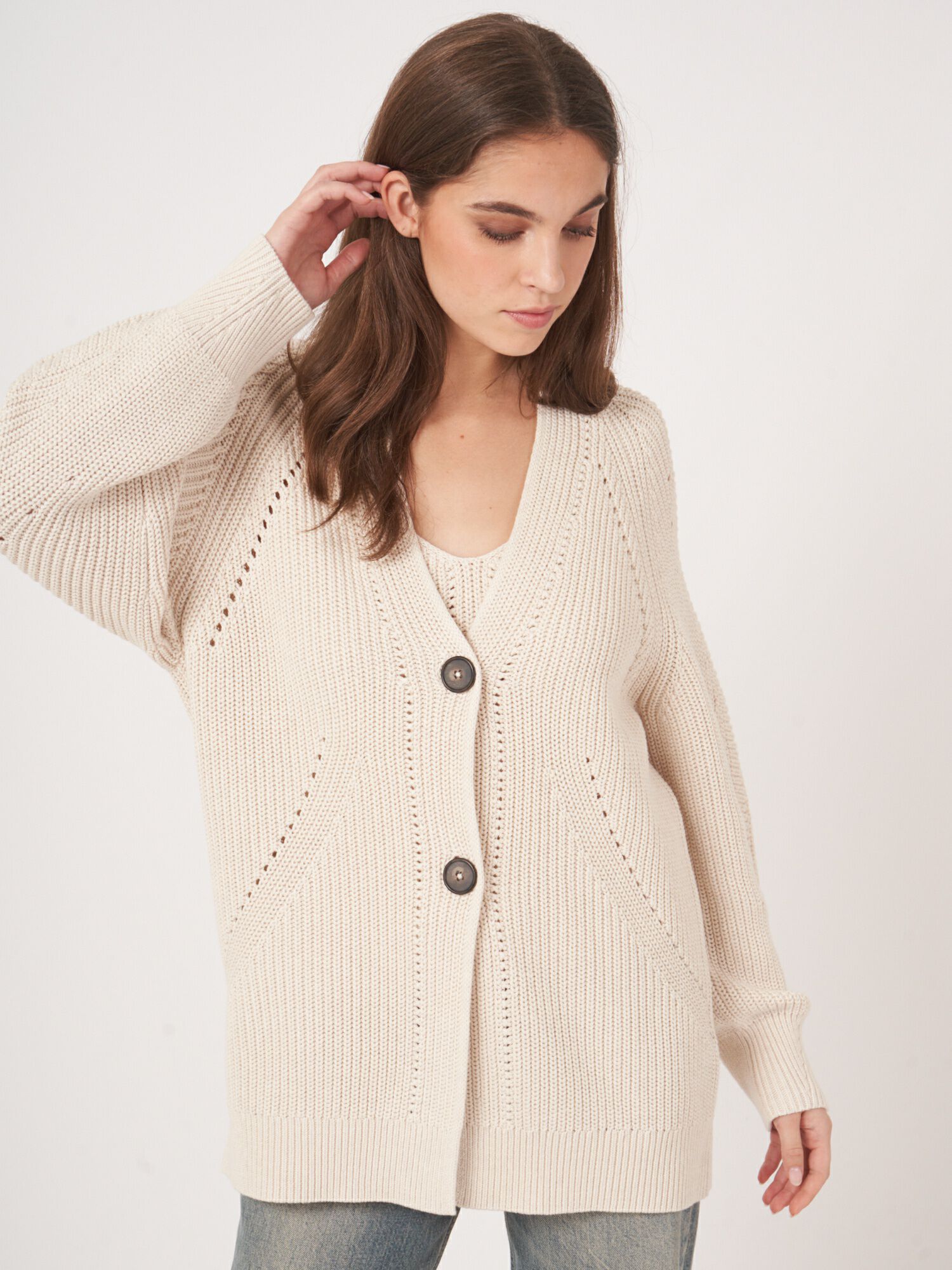 Middellang grof gebreid vest