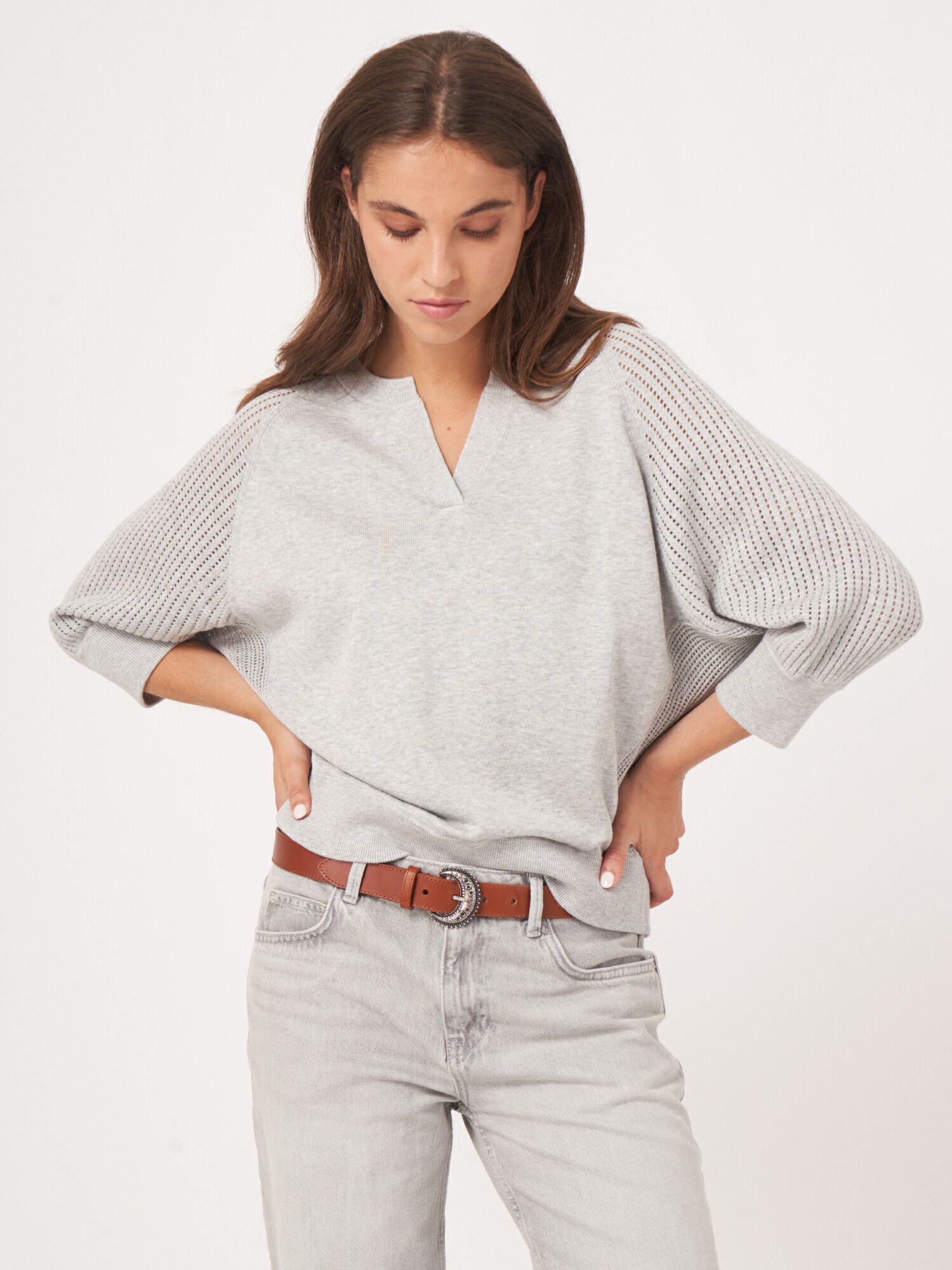 Cotton blend sweater with open knit raglan sleeves