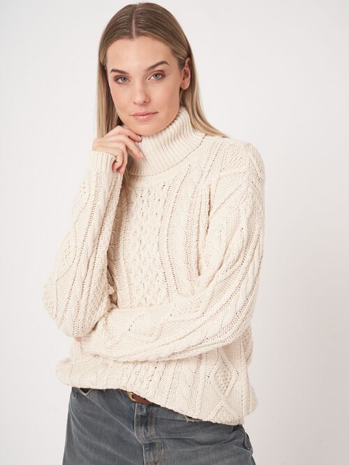 Chunky knit cotton sweater with cable design