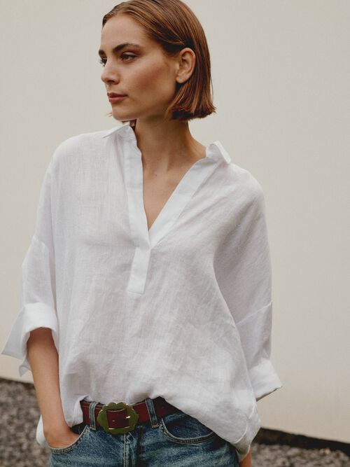 Oversized linen blouse with polo neck