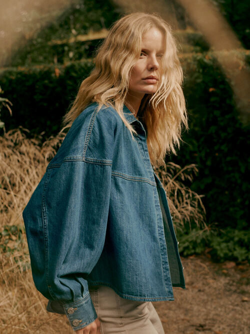 Women&rsquo;s denim blouse with puff sleeves
