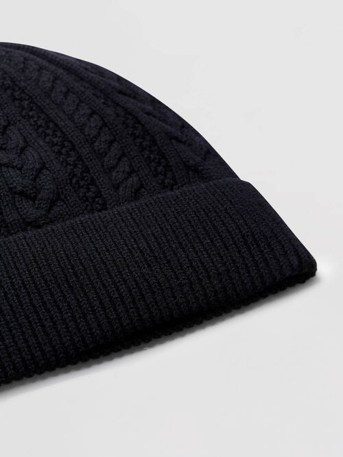 Warme kabelmuts van merinowol