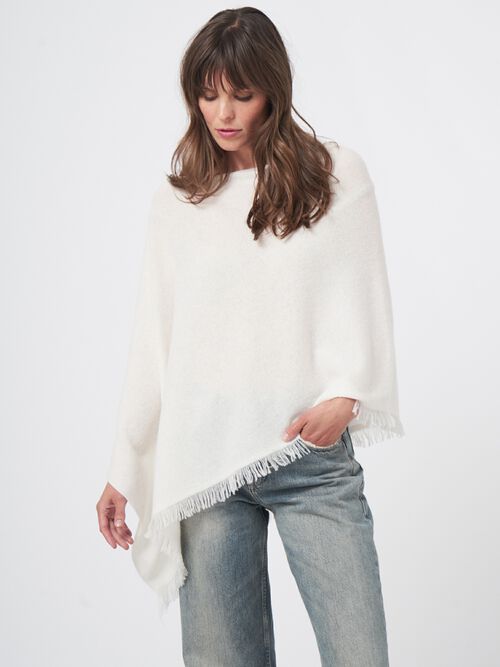 Fijngebreide poncho van organisch kasjmier met franjes