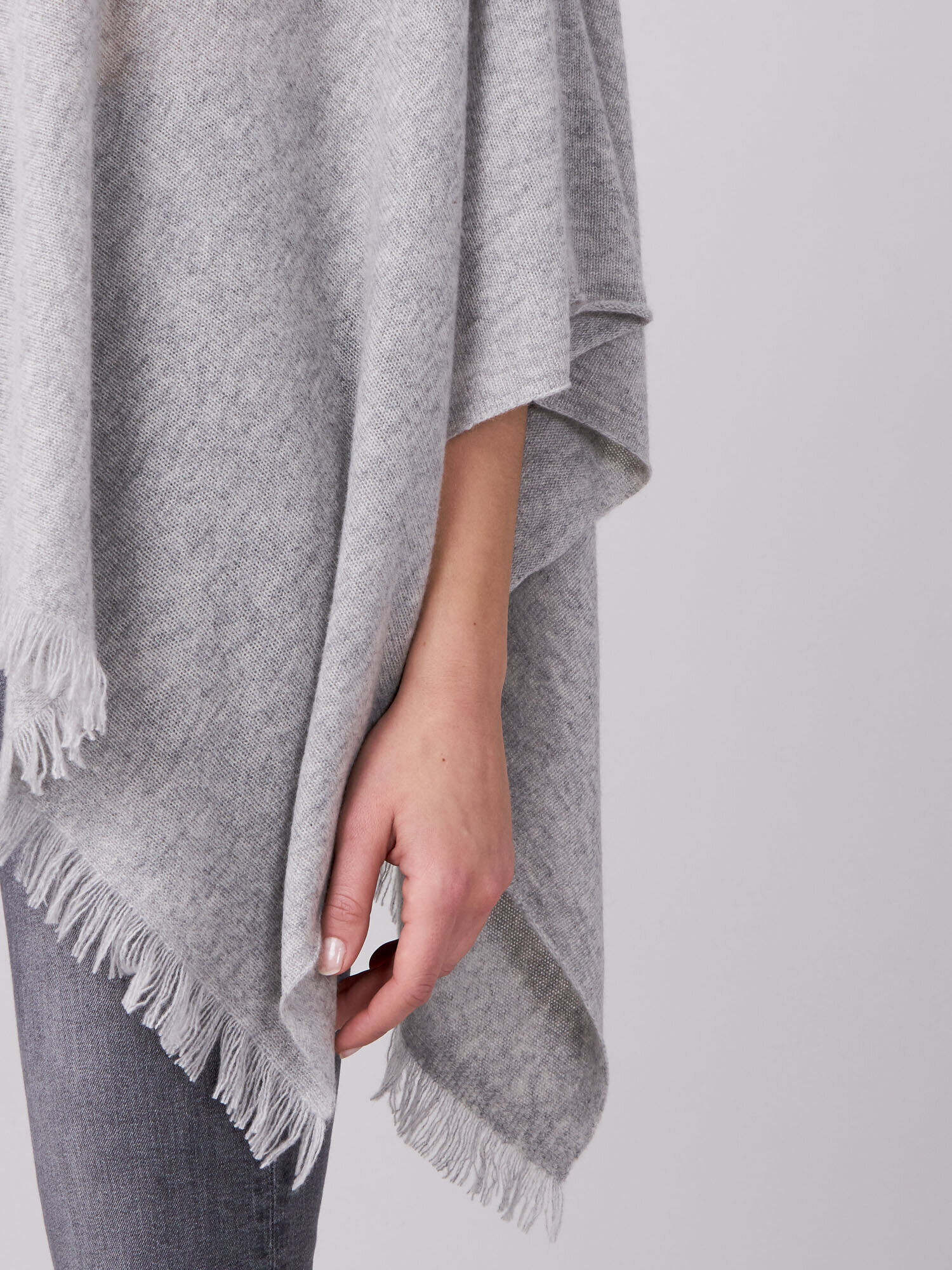 Fine knit organic cashmere poncho with fringes