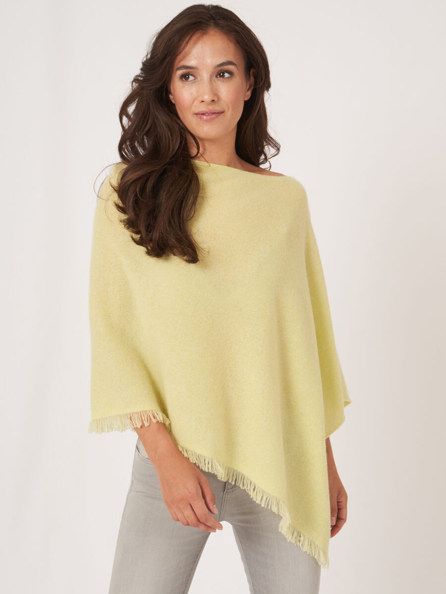 Fine knit organic cashmere poncho with fringes |