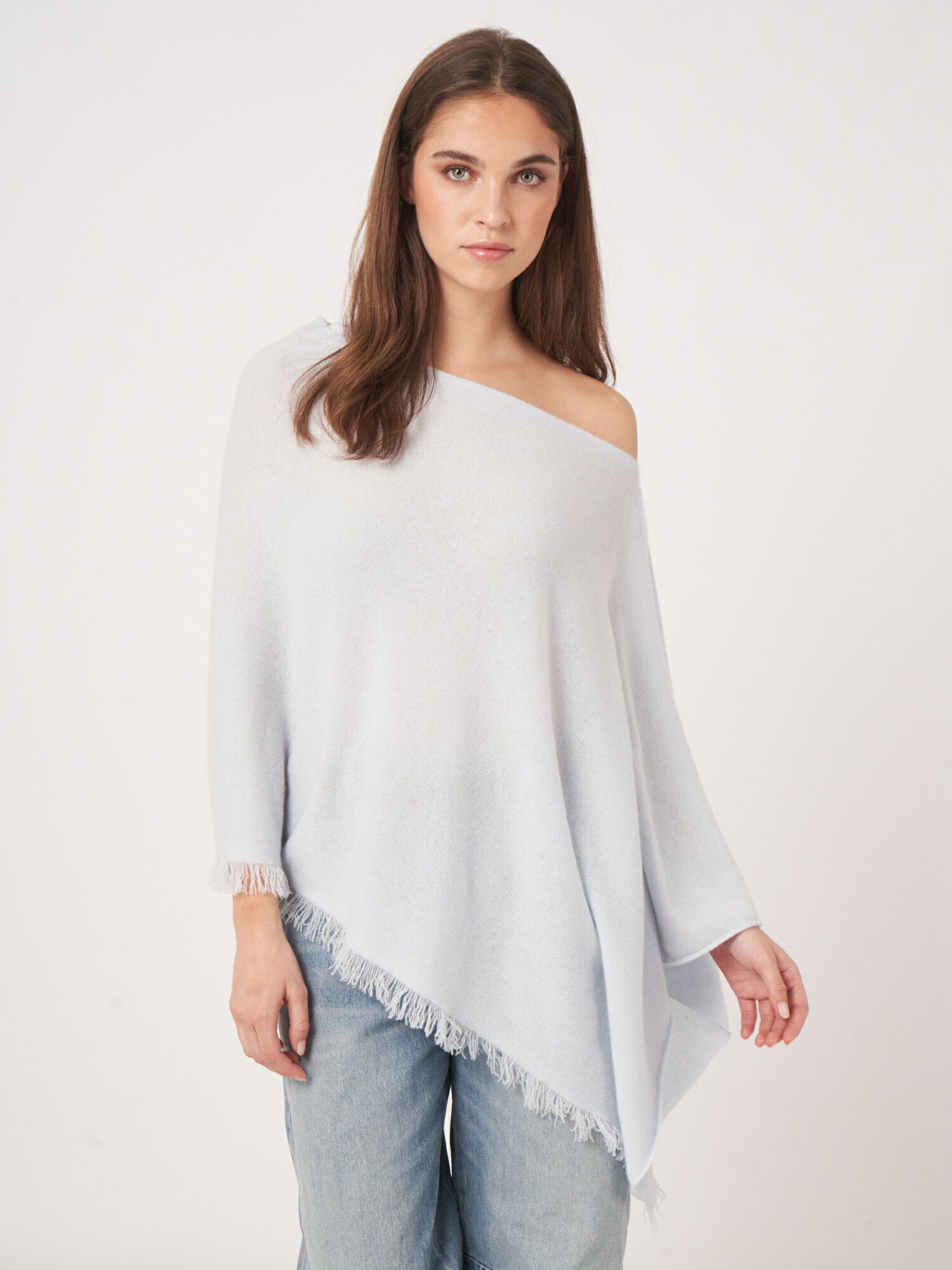 Organisch cashmere poncho met franjes