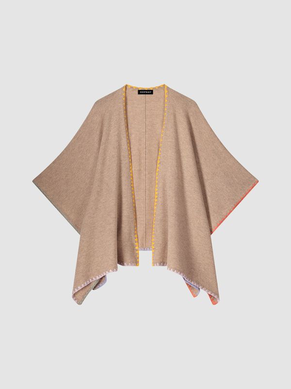 Cape à points de couverture aux couleurs contrastées image number 1