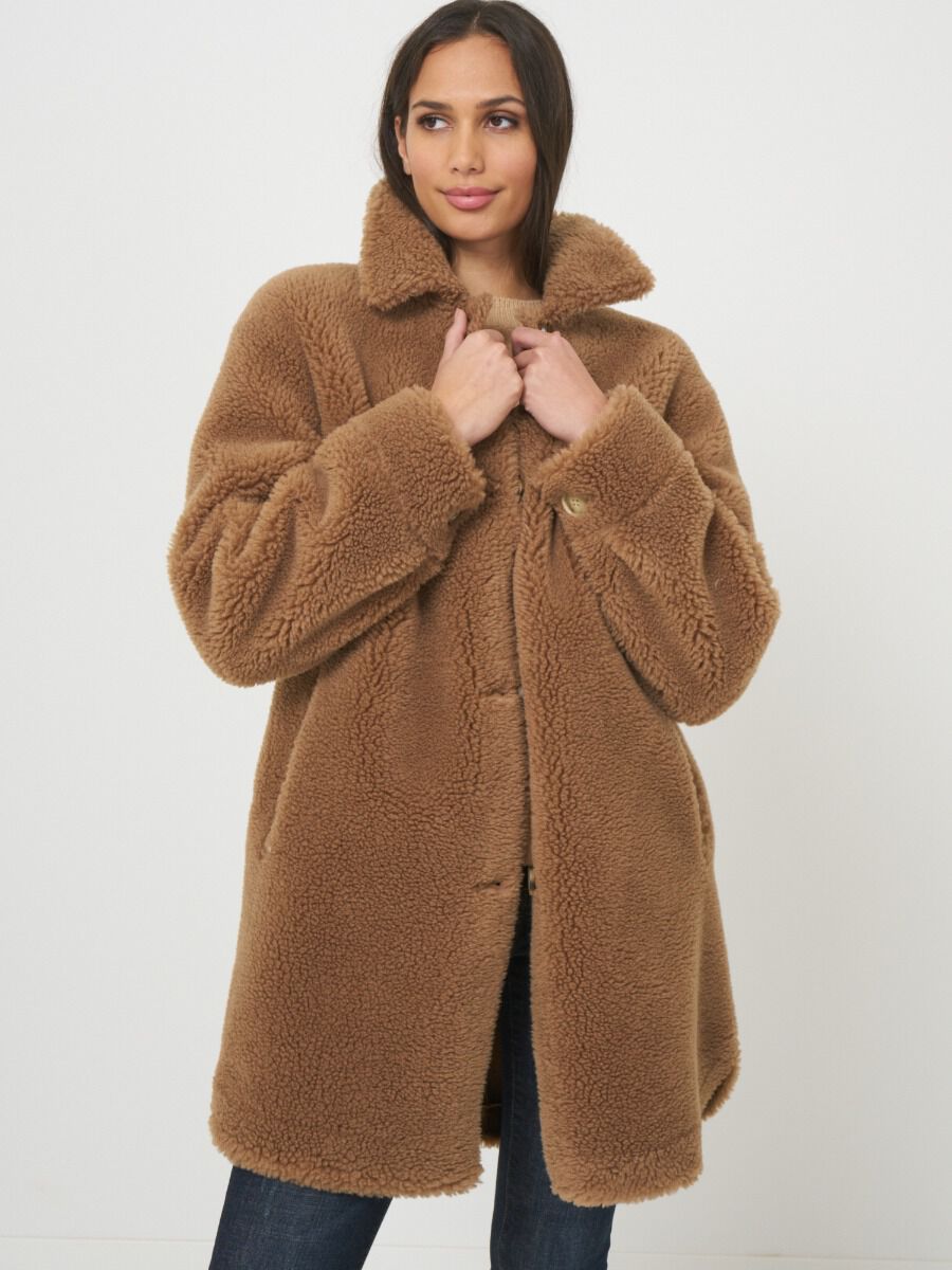 Mid length reversible faux shearling coat image number 0