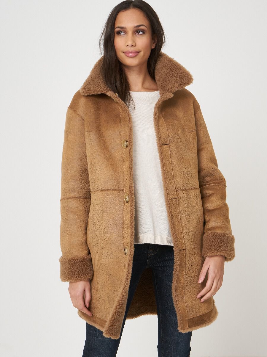 Mid length reversible faux shearling coat image number 1