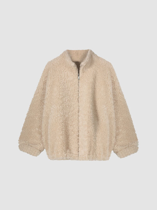Omkeerbare jas van teddy wol met dubbele rits