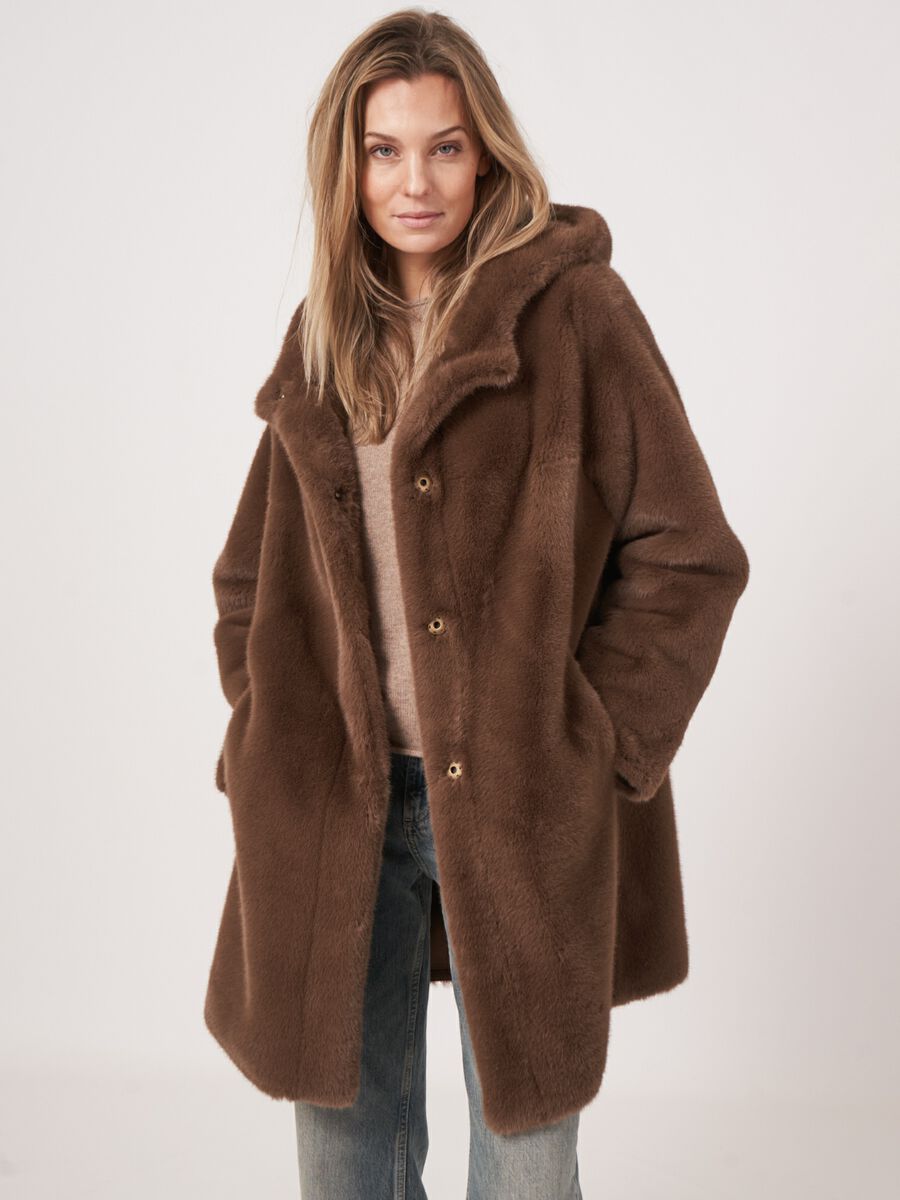 Omkeerbare faux fur jas met capuchon image number 0