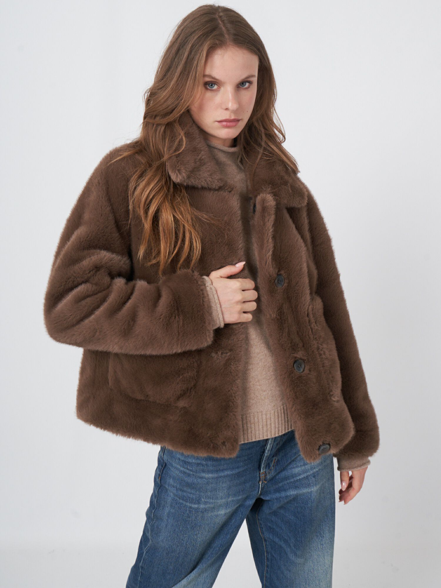 Korte omkeerbare faux fur jas