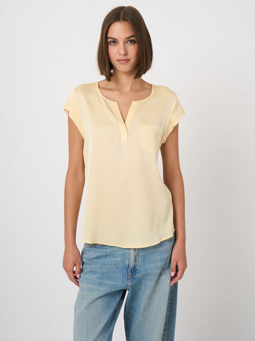 Top with chest pocket
