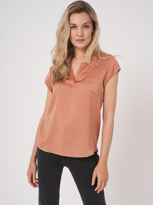 Top with chest pocket
